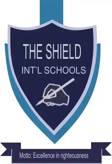 The shield international schools logo