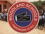 Woodland Nursery and Primary School logo